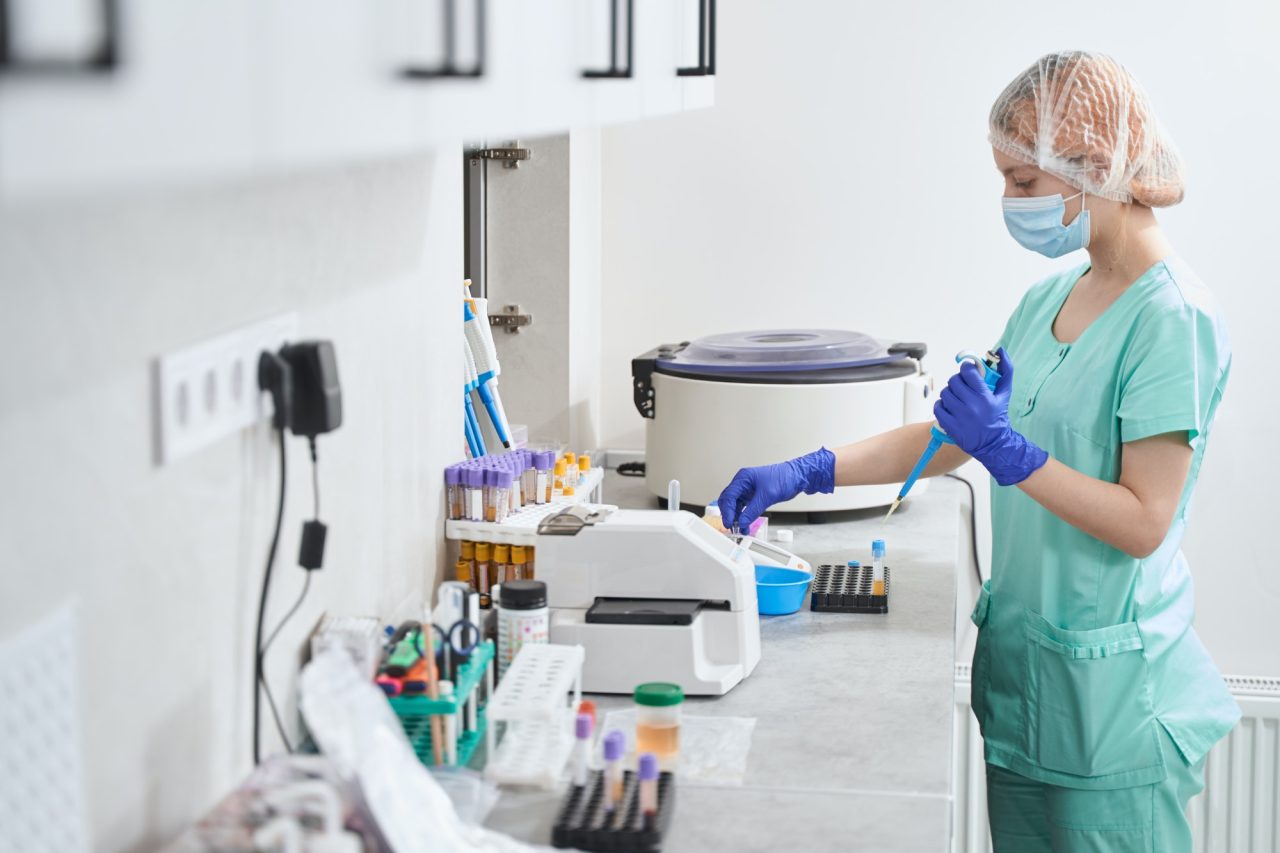 female-in-medical-suit-working-in-laboratory.jpg